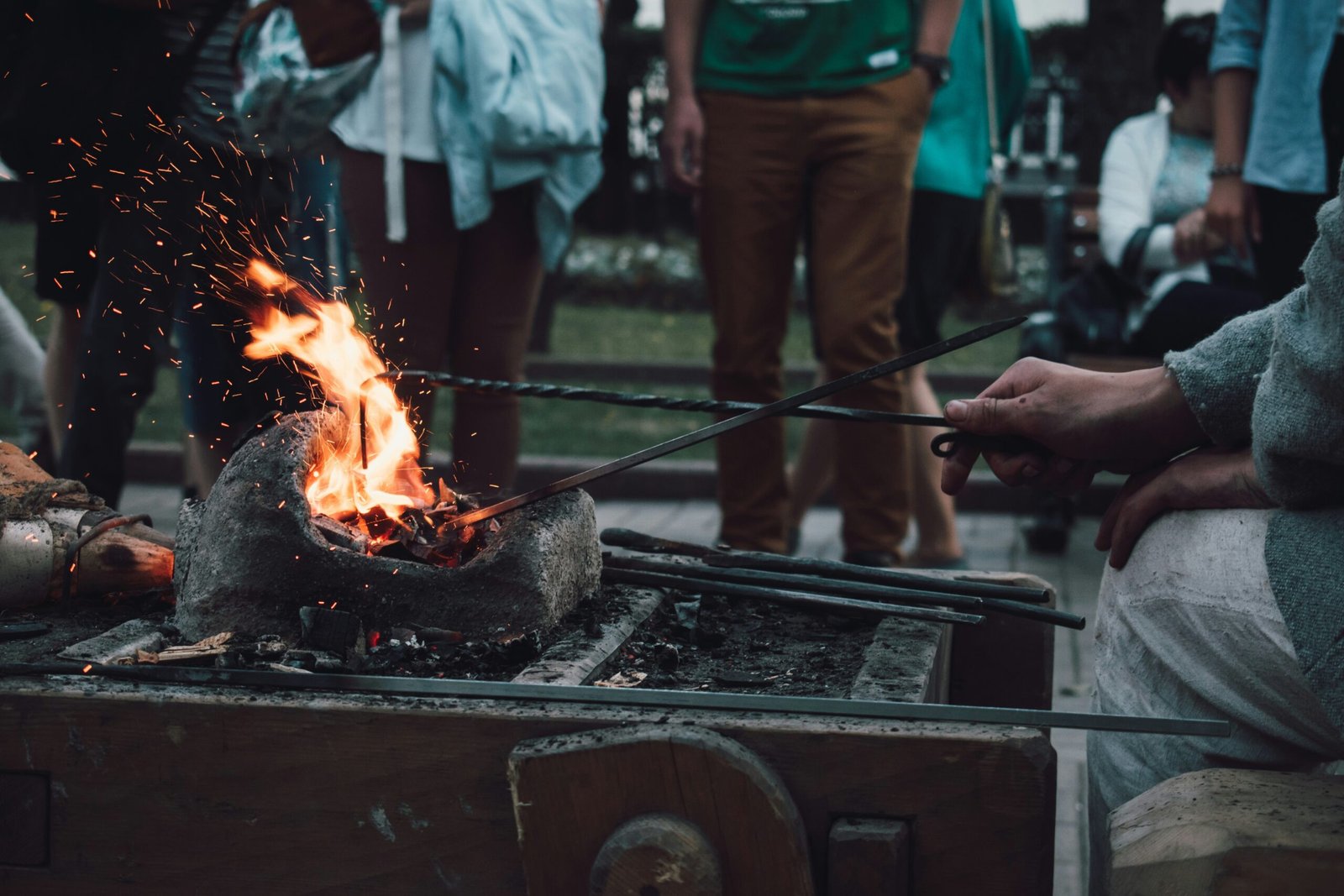 fire on pot in front of crowd