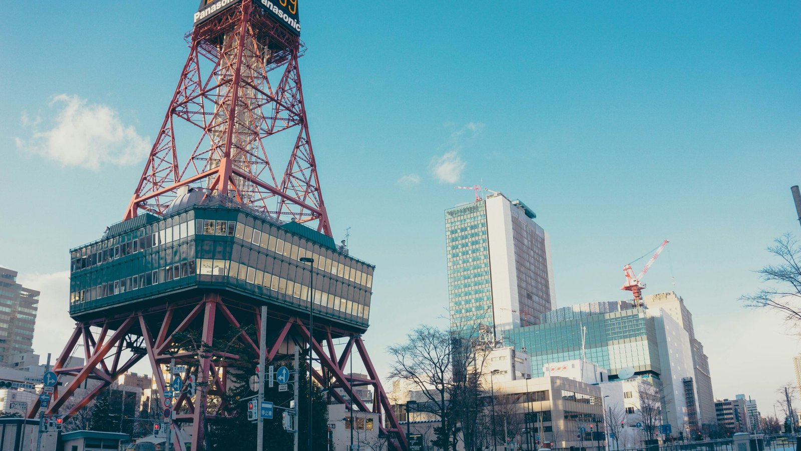 red and black tower beside building