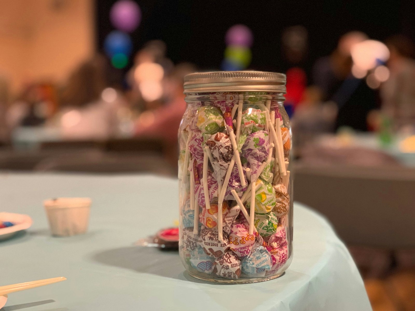 candies in a jar close-up photography