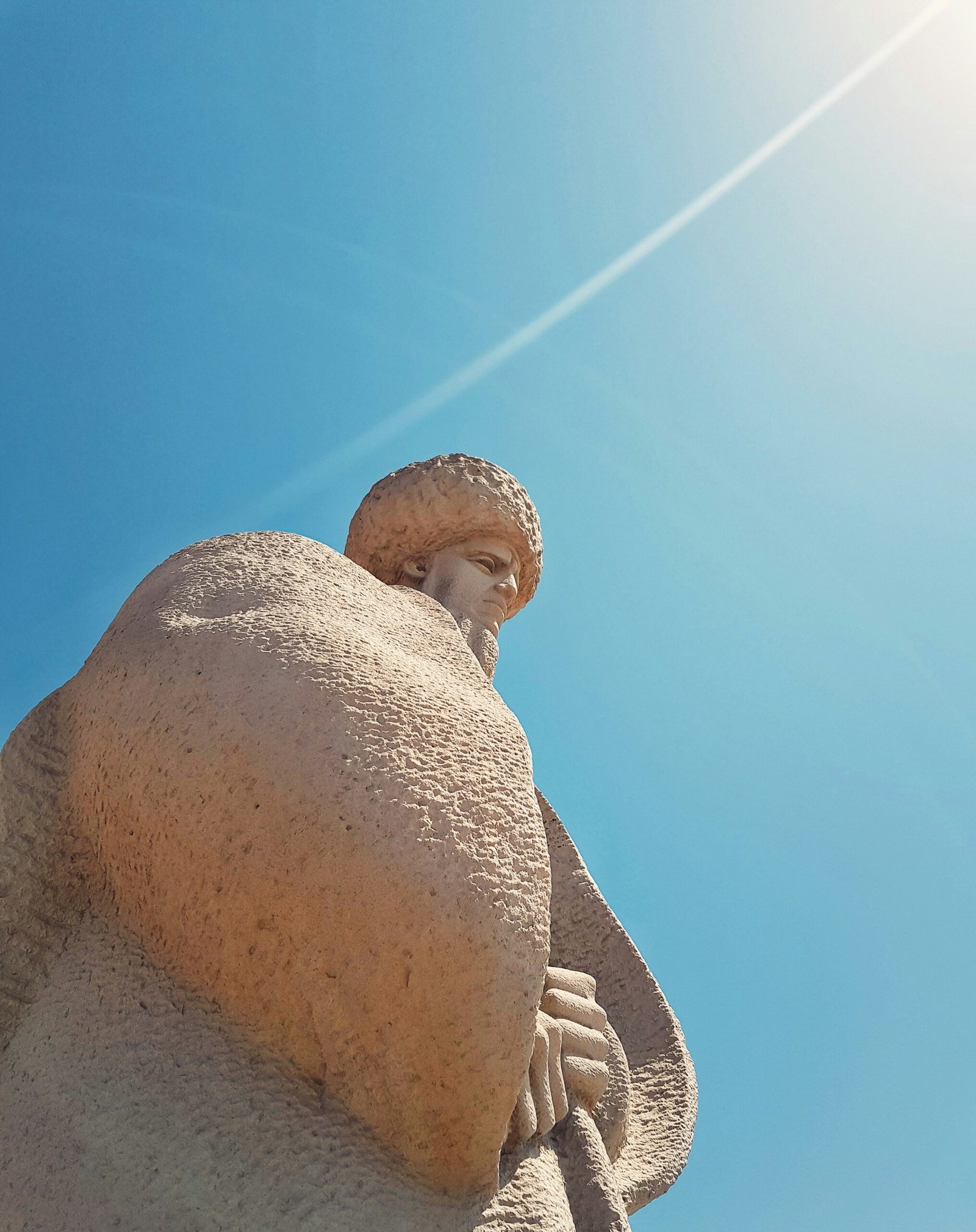 low angle photo of man's statue