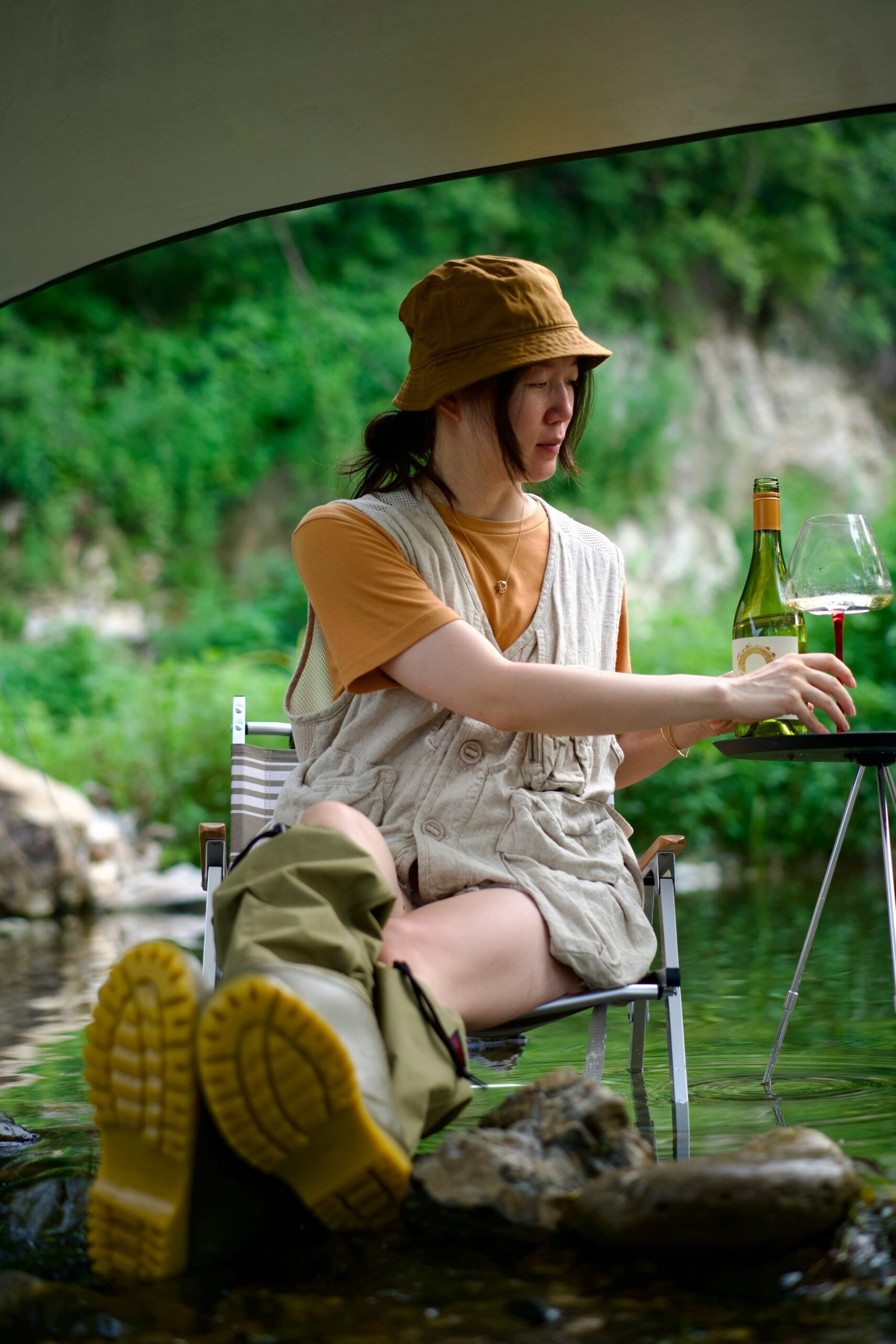 a person sitting under an umbrella